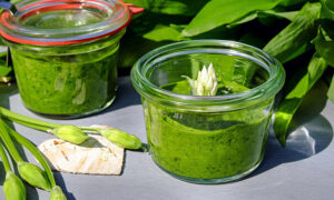 Dairy-free and oil-free pesto in glass containers