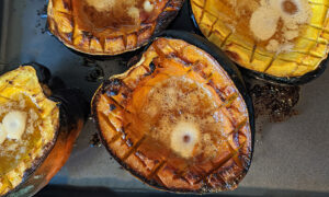 Acorn squash roasted with brown sugar and vegan butter