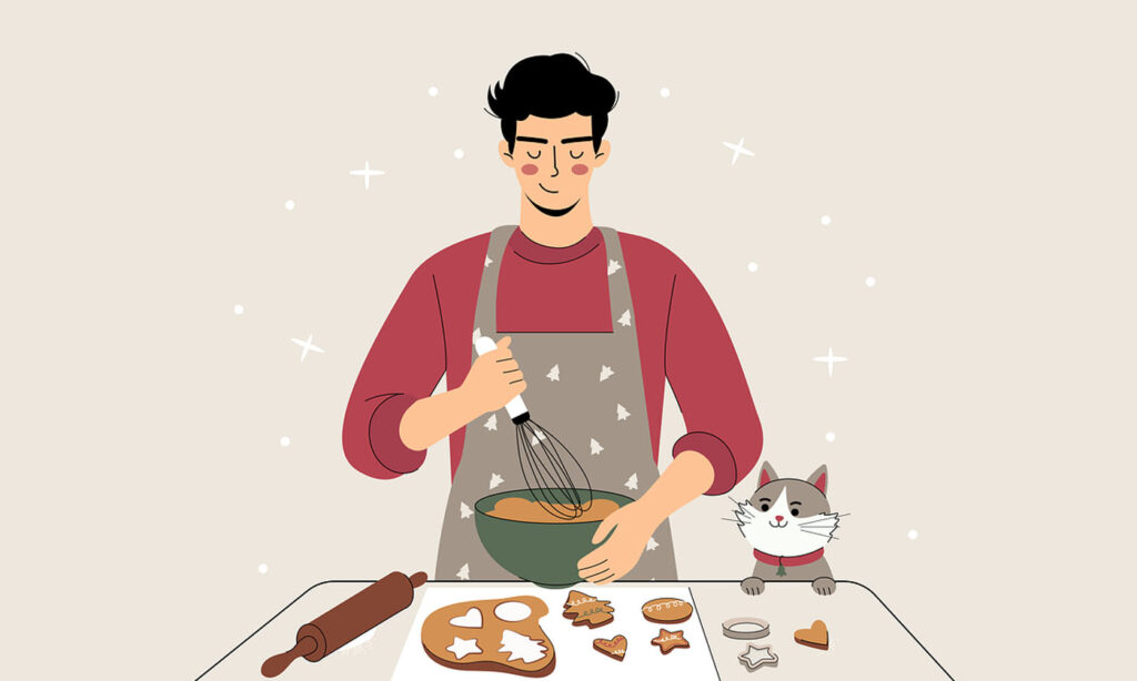 Person baking cookies with a cat, mixing in a bowl
